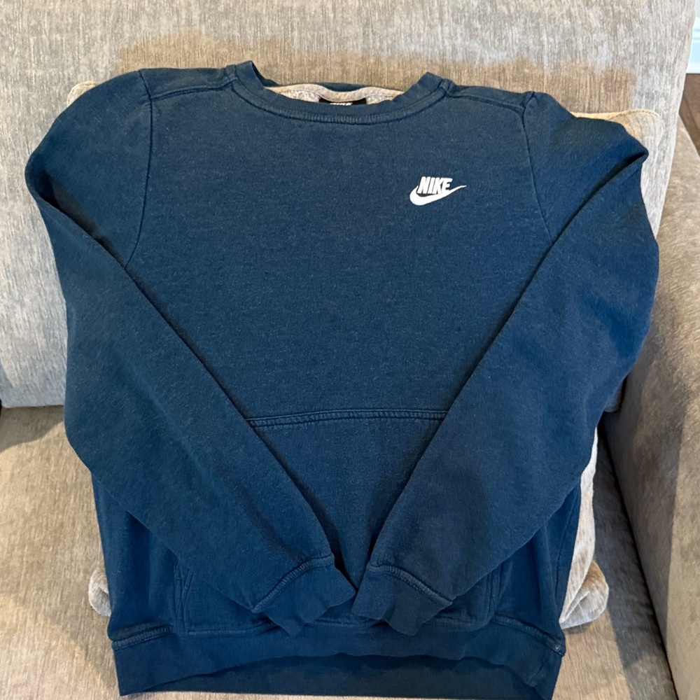 Nike crew neck sweatshirt size Small. In a dark blue/green. Tons of life left!